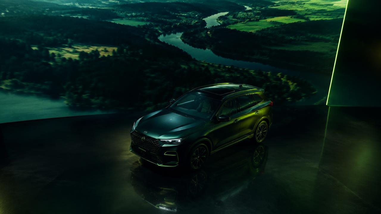 Photorealistic 3D vehicle render composited with aerial drone footage for dealership video production